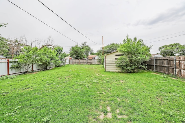 4112 S Tyler St, Amarillo, TX 79110 - fenced backyard with a storage unit