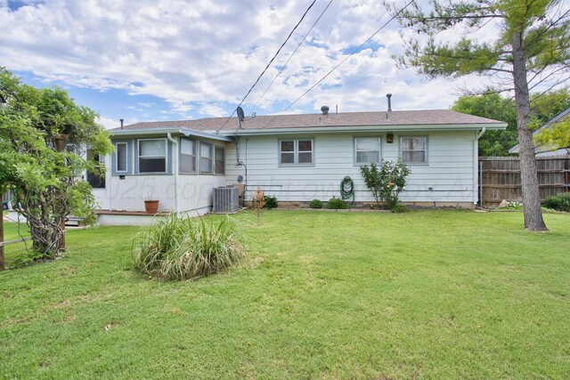 1909 N Wells St, Pampa, TX 79065 - back of house with central AC unit