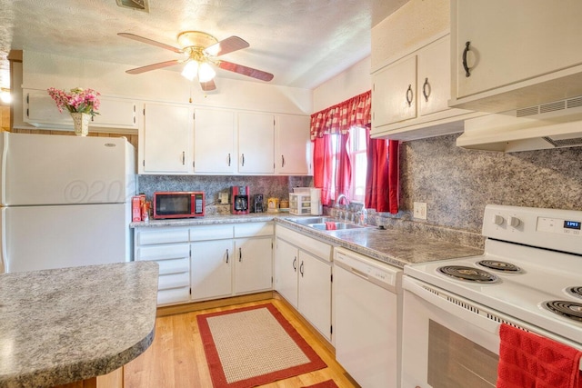 1909 N Wells St, Pampa, TX 79065 - kitchen featuring white appliances, a sink, a ceiling fan, backsplash, and white cabinetry
