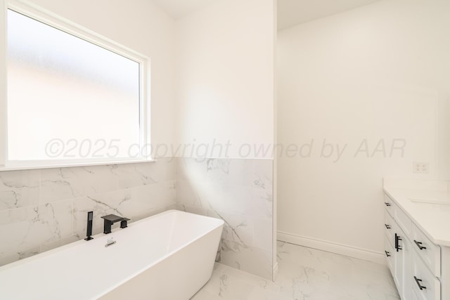 2909 Daytona Ave, Amarillo, TX 79118 - full bath with a freestanding tub, vanity, and marble finish floors
