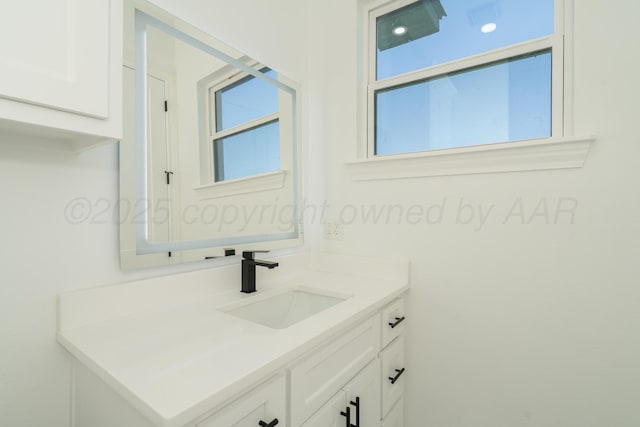 2909 Daytona Ave, Amarillo, TX 79118 - bathroom with vanity and plenty of natural light