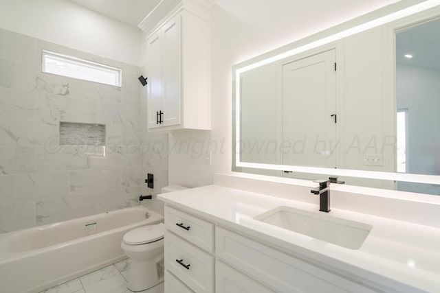 2909 Daytona Ave, Amarillo, TX 79118 - full bathroom featuring marble look tiles, vanity, and bathing tub / shower combination