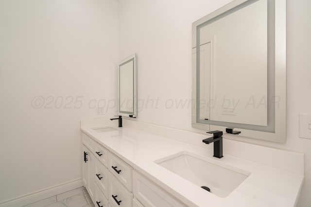 2909 Daytona Ave, Amarillo, TX 79118 - bathroom with marble look tile flooring and double vanity