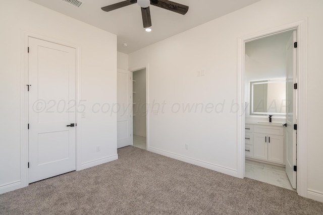 2909 Daytona Ave, Amarillo, TX 79118 - unfurnished bedroom featuring light colored carpet, ensuite bath, recessed lighting, and ceiling fan