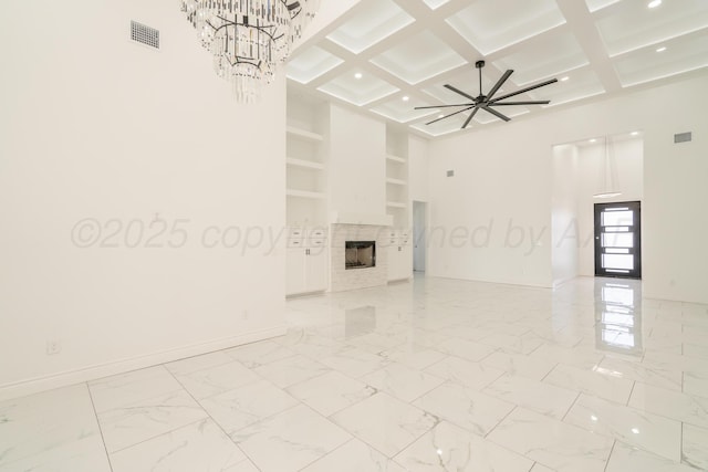 2909 Daytona Ave, Amarillo, TX 79118 - unfurnished living room featuring a high ceiling, beamed ceiling, a ceiling fan, a chandelier, and a tile fireplace