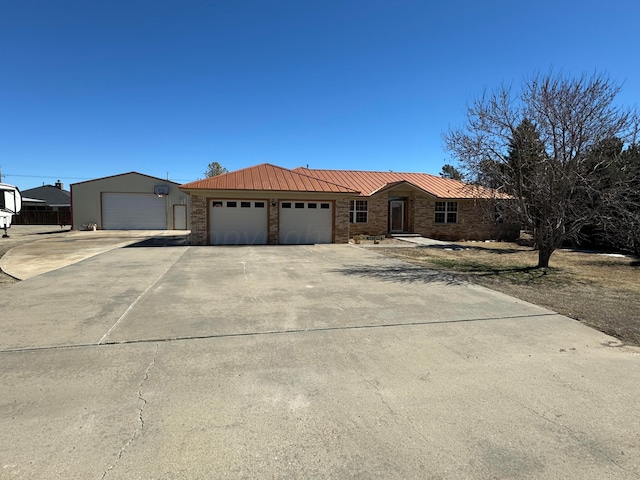 single story home featuring a garage