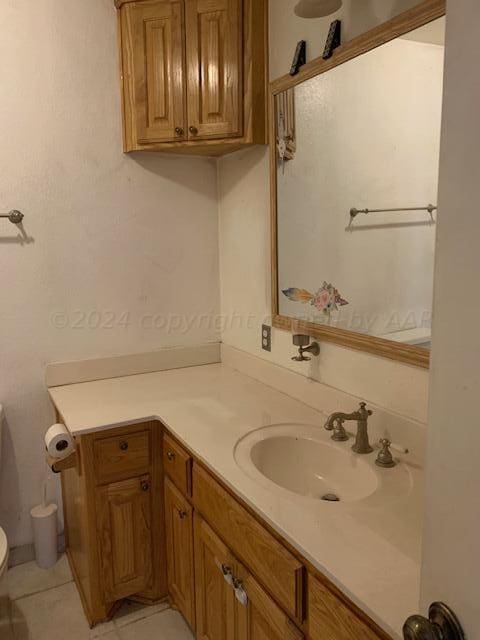 3610 S Harrison St, Amarillo, TX 79110 - bathroom featuring vanity and toilet