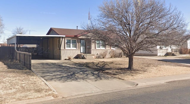 view of front of property with a carport