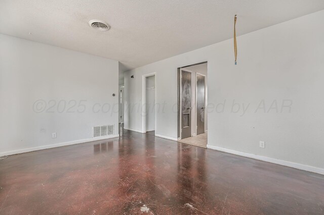 2902 Pryor St, Amarillo, TX 79103 - spare room with baseboards and finished concrete floors