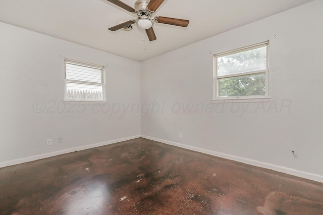 2902 Pryor St, Amarillo, TX 79103 - unfurnished room with plenty of natural light, unfinished concrete flooring, and a ceiling fan