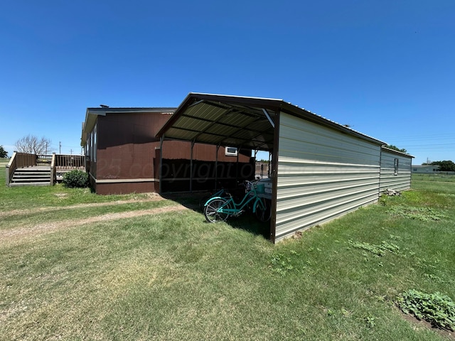 712 Groom Ave, Panhandle, TX 79068 - view of outdoor structure featuring a carport