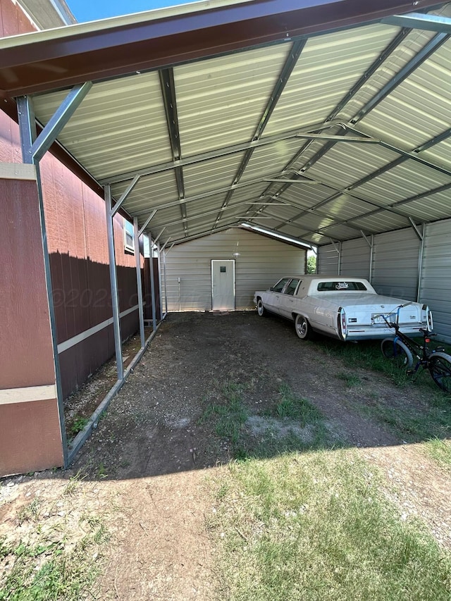 712 Groom Ave, Panhandle, TX 79068 - view of vehicle parking featuring a carport