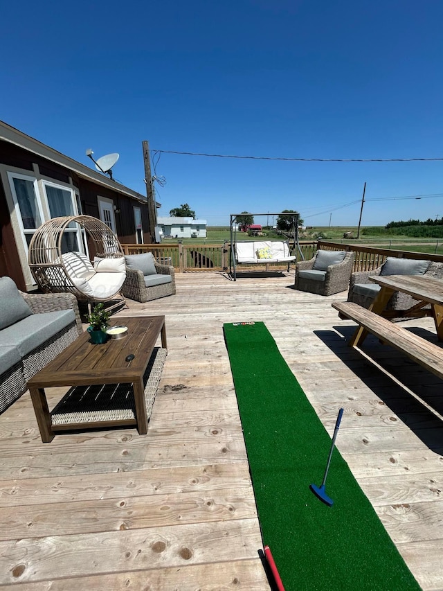 712 Groom Ave, Panhandle, TX 79068 - wooden deck featuring an outdoor hangout area
