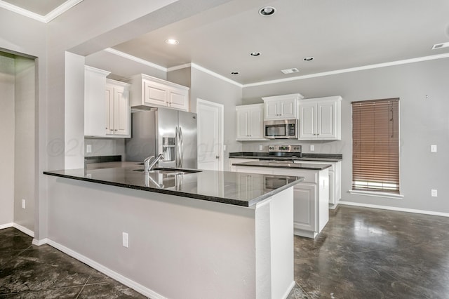 7907 Crestline Dr, Amarillo, TX 79119 - kitchen featuring appliances with stainless steel finishes, a peninsula, concrete floors, white cabinets, and ornamental molding