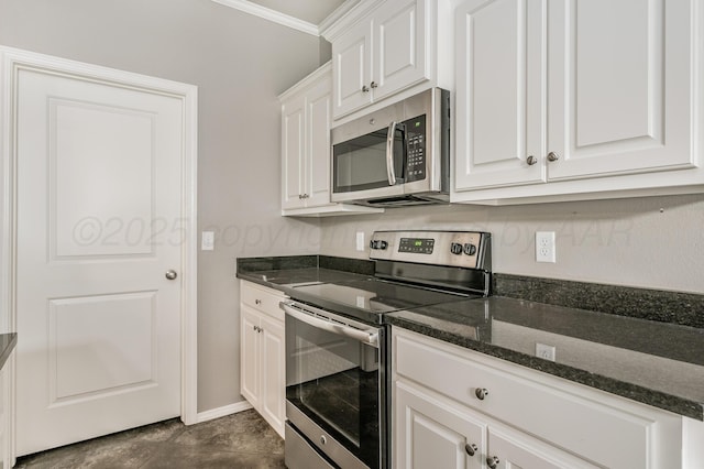 7907 Crestline Dr, Amarillo, TX 79119 - kitchen with appliances with stainless steel finishes, crown molding, white cabinetry, and dark stone countertops