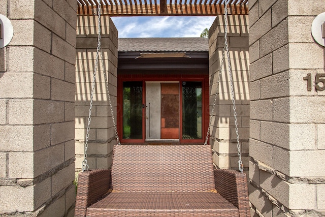 1510 Crockett St, Amarillo, TX 79102 - property entrance featuring a shingled roof and a pergola