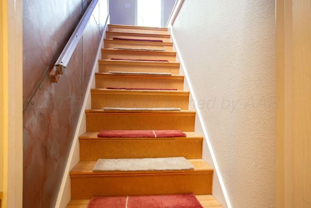 1510 Crockett St, Amarillo, TX 79102 - staircase with a textured wall and wood finished floors