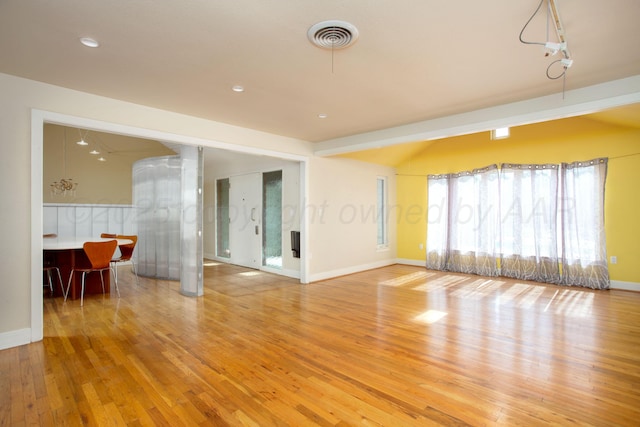 1510 Crockett St, Amarillo, TX 79102 - unfurnished living room with light wood finished floors and recessed lighting