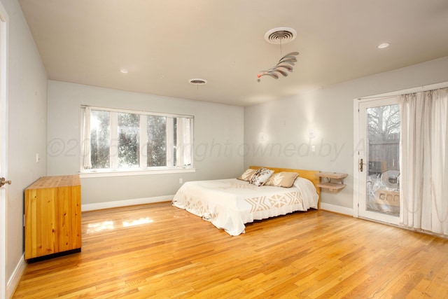 1510 Crockett St, Amarillo, TX 79102 - bedroom with access to outside, light wood finished floors, and recessed lighting