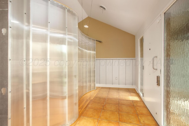 1510 Crockett St, Amarillo, TX 79102 - hall featuring vaulted ceiling and tile patterned floors