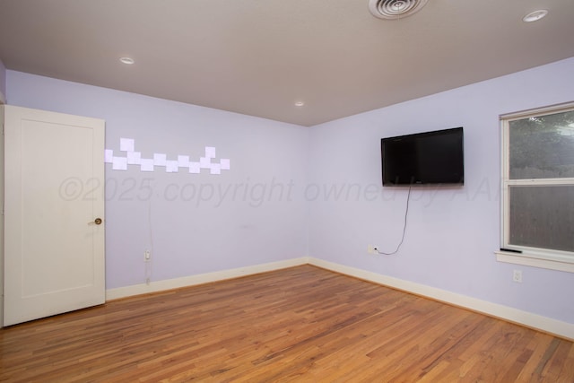 1510 Crockett St, Amarillo, TX 79102 - empty room featuring wood finished floors and recessed lighting