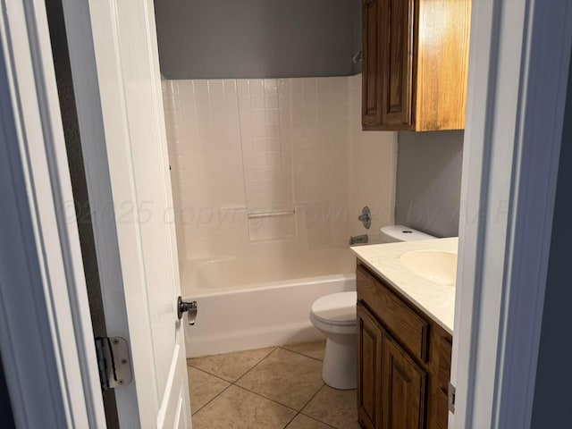 full bath with vanity,  shower combination, tile patterned flooring, and toilet