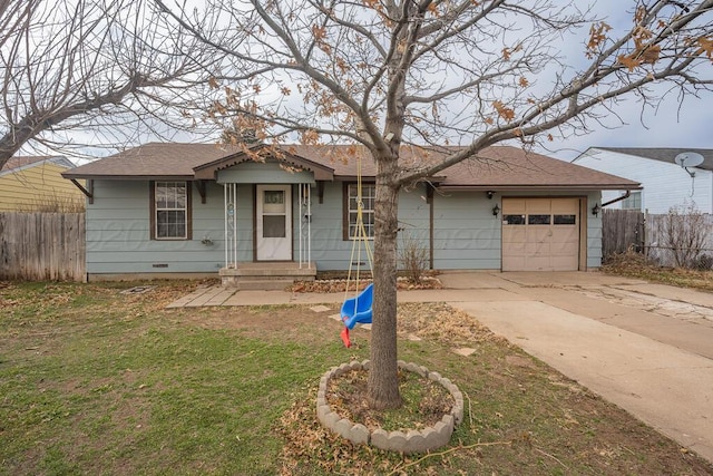 ranch-style home with a garage and a front lawn