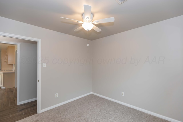 5519 Alvarado Rd, Amarillo, TX 79106 - unfurnished room featuring a ceiling fan and carpet floors