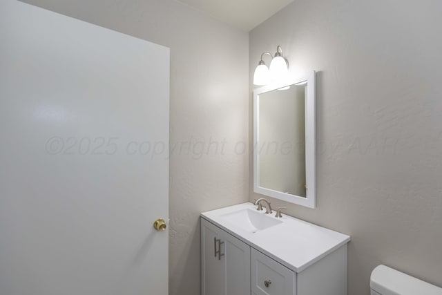 5519 Alvarado Rd, Amarillo, TX 79106 - half bathroom featuring toilet and vanity