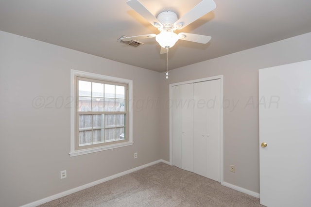 5519 Alvarado Rd, Amarillo, TX 79106 - unfurnished bedroom with carpet flooring, a closet, and ceiling fan