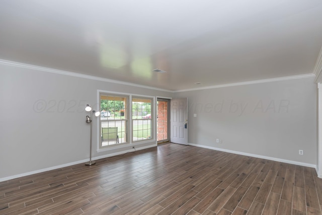 5519 Alvarado Rd, Amarillo, TX 79106 - unfurnished room featuring dark wood-style floors and crown molding