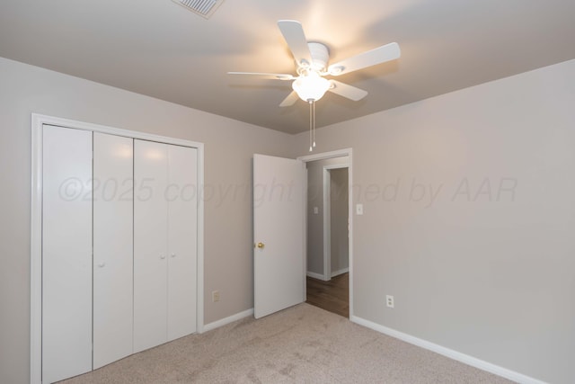 5519 Alvarado Rd, Amarillo, TX 79106 - unfurnished bedroom with carpet, a closet, and ceiling fan
