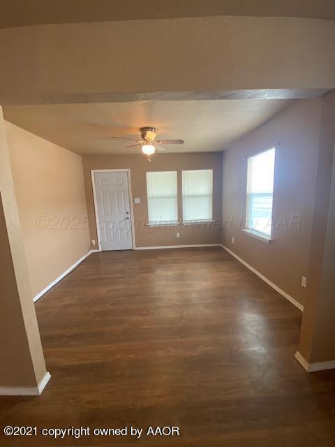 303 S Louisiana St, Amarillo, TX 79106 - unfurnished room with dark wood finished floors and a ceiling fan