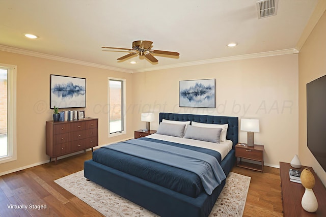 3449 Irving Ln, Amarillo, TX 79121 - bedroom with crown molding, wood finished floors, recessed lighting, and ceiling fan
