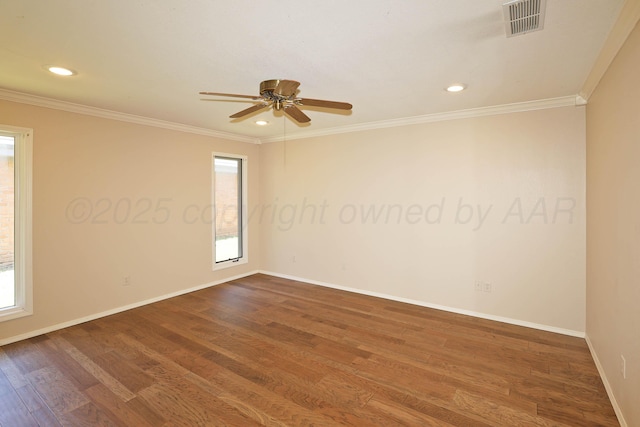 3449 Irving Ln, Amarillo, TX 79121 - empty room with dark wood finished floors, ceiling fan, ornamental molding, and recessed lighting
