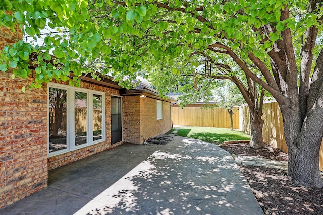 3449 Irving Ln, Amarillo, TX 79121 - fenced backyard featuring a patio