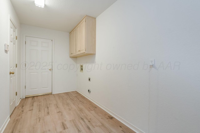 6011 Belpree Rd, Amarillo, TX 79106 - washroom featuring cabinet space, electric dryer hookup, light wood-style floors, and washer hookup