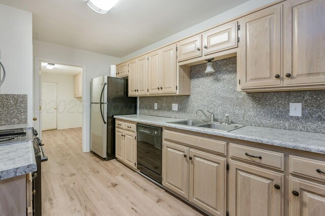 6011 Belpree Rd, Amarillo, TX 79106 - kitchen with stainless steel appliances, light brown cabinets, light countertops, and tasteful backsplash