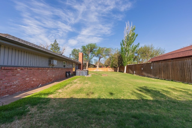 view of yard with a fenced backyard