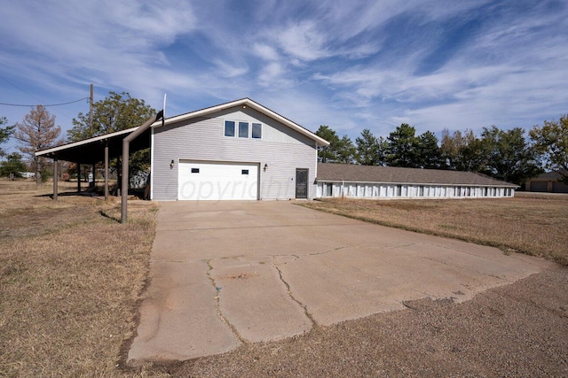 view of property exterior featuring a yard and a carport