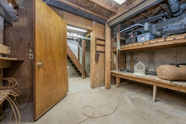 unfinished basement with stairs