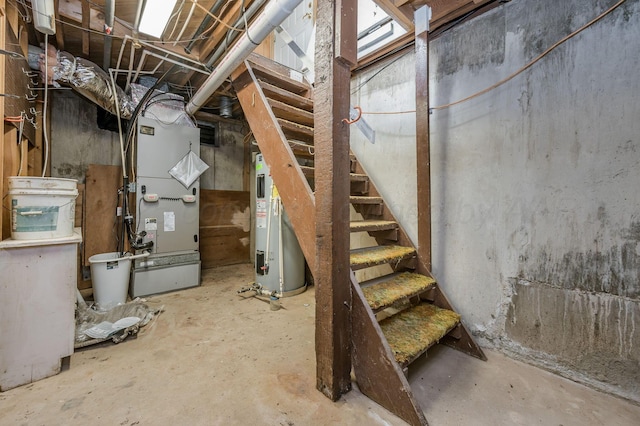 unfinished basement featuring stairway, electric water heater, and heating unit