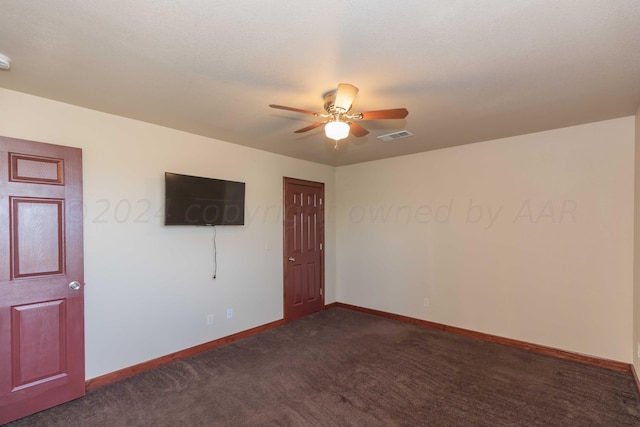 carpeted empty room with ceiling fan