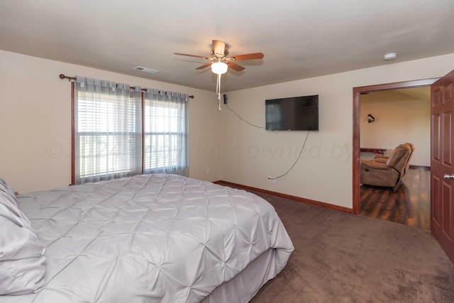 carpeted bedroom with ceiling fan