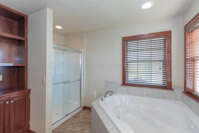 bathroom featuring plus walk in shower