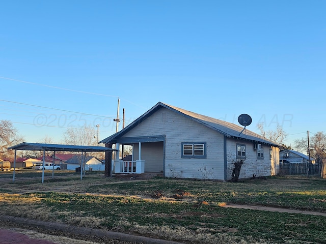view of side of home featuring a porch