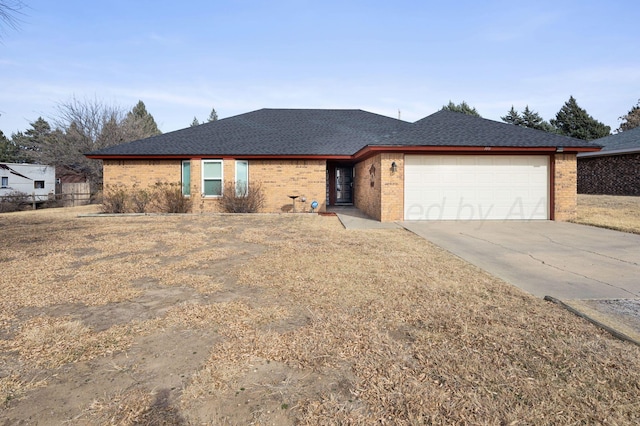 ranch-style house featuring a garage