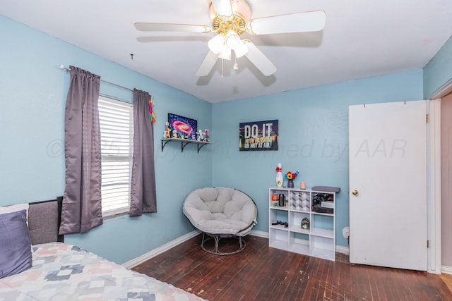 210 Oak Ave, Dumas, TX 79029 - bedroom with hardwood / wood-style floors and ceiling fan