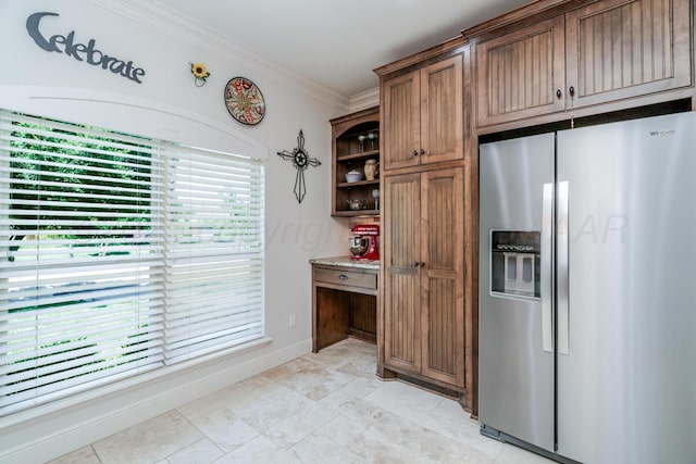 7601 Continental Pkwy, Amarillo, TX 79119 - kitchen with stainless steel refrigerator with ice dispenser, crown molding, brown cabinetry, and open shelves