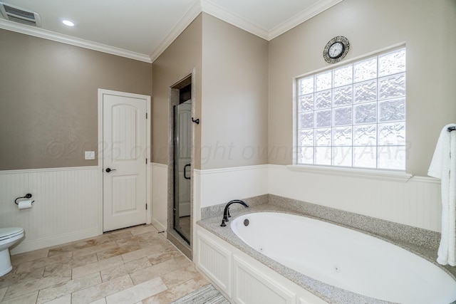 7601 Continental Pkwy, Amarillo, TX 79119 - full bath featuring a tub with jets, a wainscoted wall, a shower stall, and crown molding
